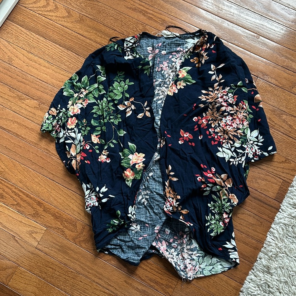 Open light weight cardigan.